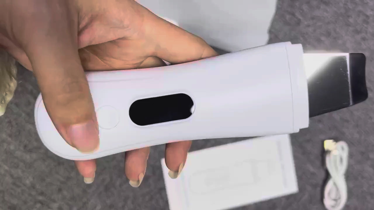 The Sonave scrubber held in hand, switching between its modes